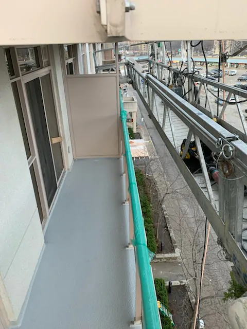 Professional waterproofing service applied to high-rise building rooftop and balcony in Toronto by NHC Restoration