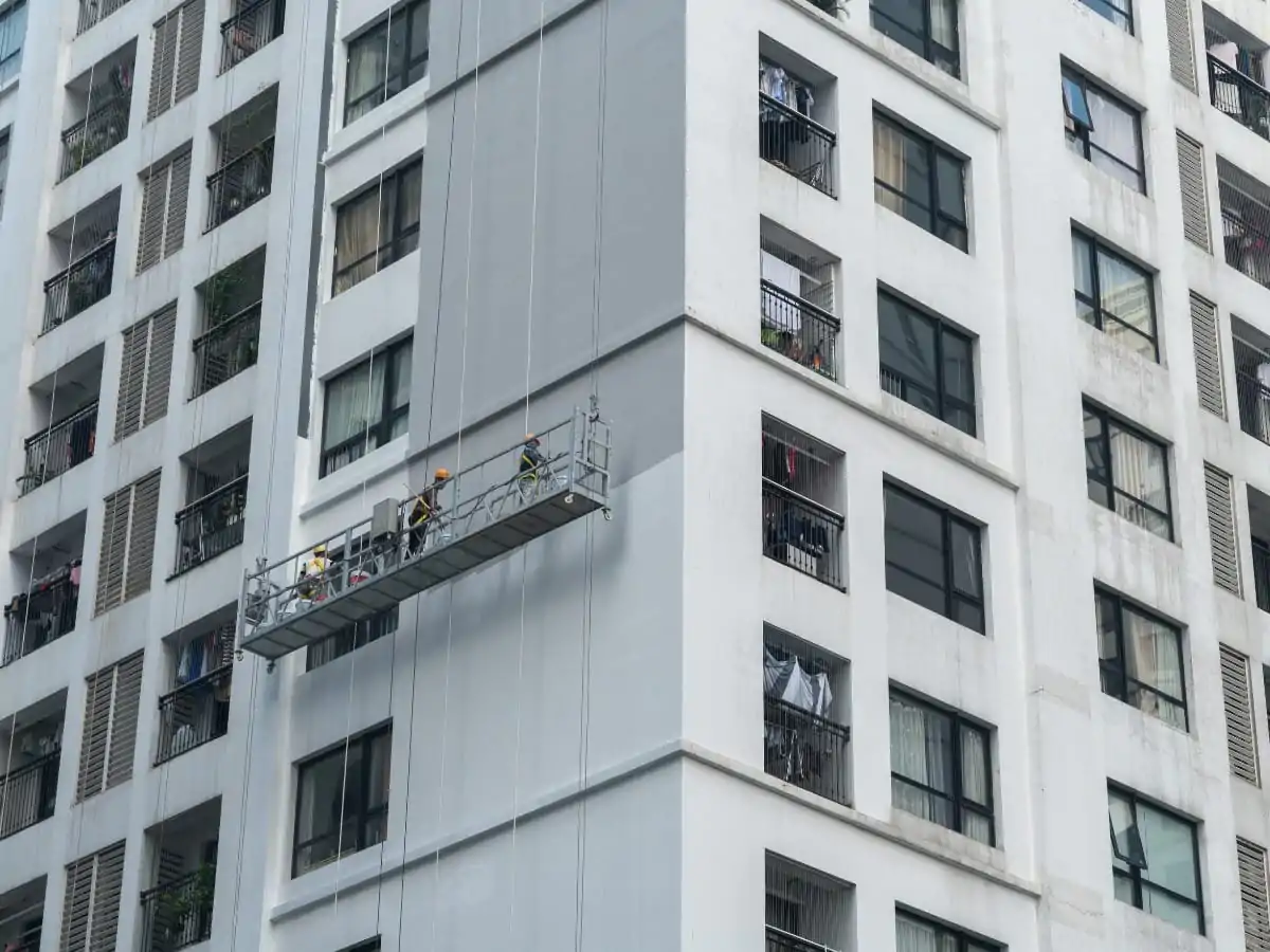 Swing stage suspended scaffold system installed on high-rise building exterior in Toronto by NHC Restoration