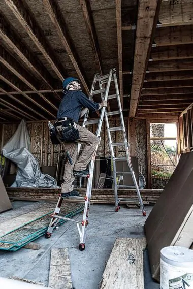 Ladder used for low-level building inspection and small-scale restoration work in Toronto